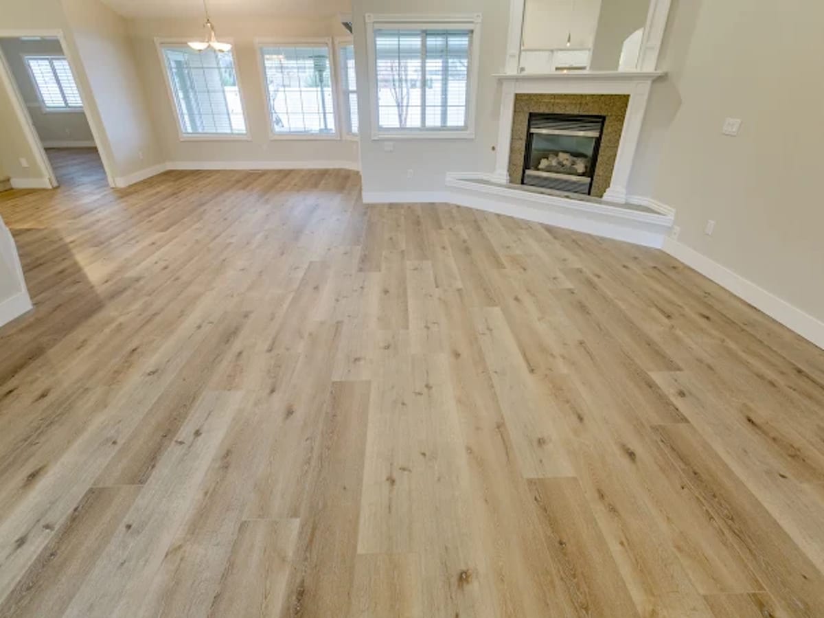 Wide-plank living room finished in Hardwood